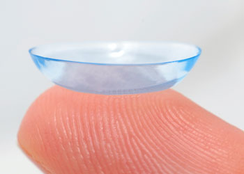 contact lens on finger